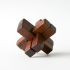 魯班鎖<br /><b>Burr puzzles</b><br />Wood, brass<br />China; 19th-20th c.<br />6.6 x 6.7 x 7.1 and 6.0 x 6.0 x 6.0 cm<br /><em>Yi Zhi Tang</em> Collection 06-035, 06-022