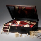 外銷象牙製益智遊戲<br/ ><b>Games box and contents</b><br />Lacquered wood, ivory, silk, brass<br />Canton; Qing dynasty, mid-19th c.<br /><em>Yi Zhi Tang</em> Collection 25-002