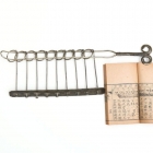 <b>銀製九連環<br/ >Nine linked rings / Chinese rings<i> (jiulianhuan)</i></b><br /><em>Baitong</em> (silver alloy)<br />China; 19th-20th c.<br /><em>Yi Zhi Tang</em> Collection 09-004<br /><br /><b>《小慧集》貯香主人著<br/ ><em>Little wisdoms</em> by Zhu Xiang Zhuren</b><br />Six volumes, cardboard case<br />[China]; [ca. 1821]<br /><em>Yi Zhi Tang</em> Collection 00-084