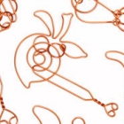<b>巧環 阮根全製作<br/ >Ingenious rings wire puzzles</b><br />Crafted by Ruan Genquan<br />Copper wire<br />Wuxi, Jiangsu Province; 1998<br /><em>Yi Zhi Tang</em> Collection 40-001