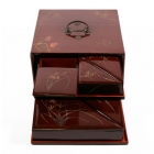 木胎漆器刻花七巧套盒<br/ ><b>Tangram boxes in case</b><br />Lacquered wood, brass<br />China; Republic period (1911-1949)<br />25.2 x 25.2 x 12.2 cm<br /><em>Yi Zhi Tang</em> Collection 72-045
