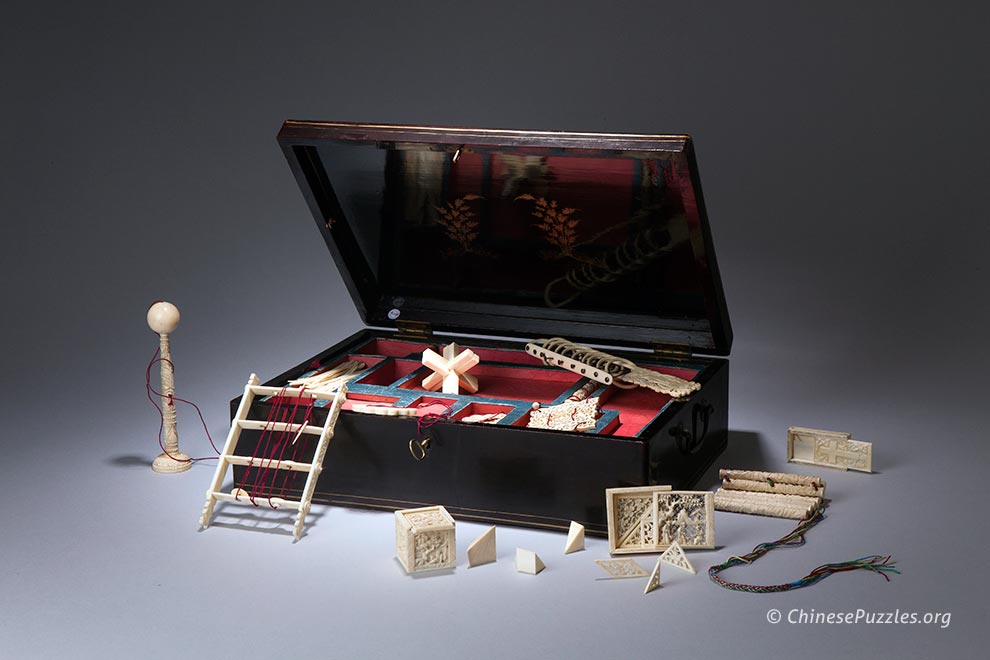 Chinese games box with ivory puzzles