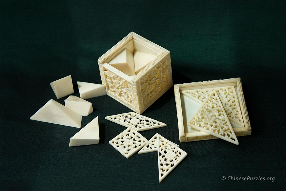 ivory cube puzzle and tangram puzzle